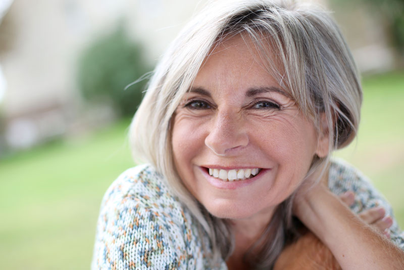 Dental Implant Smiling After Her Dental Implant Procedure