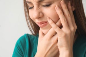 Dental Implant Patient Suffering From A Failed Dental Implant